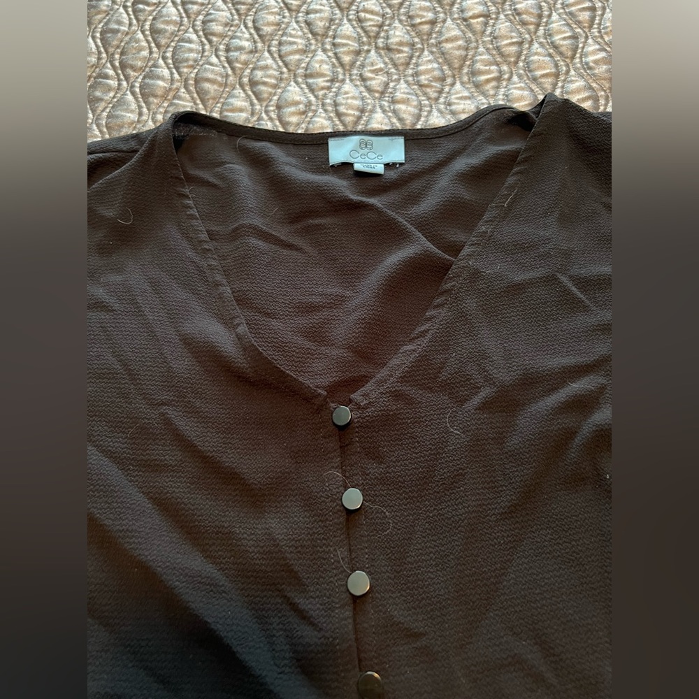 Cece woman’s black top with black buttons 1x